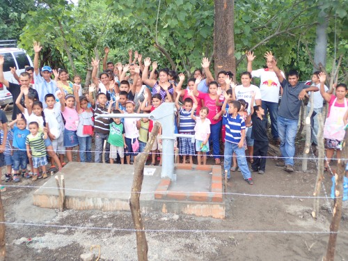The villagers rejoiced at the dedication of the water well.